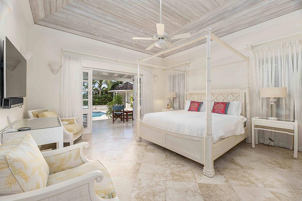 Bedroom overlooking the pool at Carlton Ridge